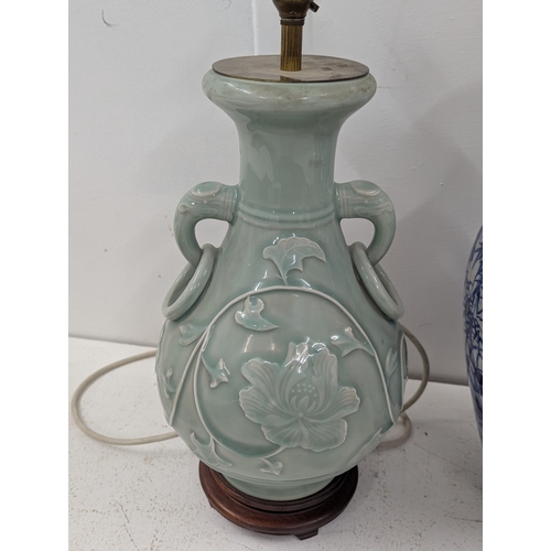 12 - A mixed lot to include a Chinese style table lamp, a Japanese blue and white vase, together with Art... 