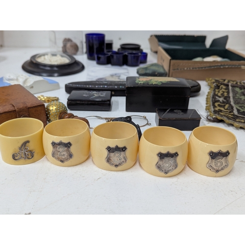 14 - Mixed collectables to include five Bakelite napkin rings having silver mounts, a Victorian black pap... 