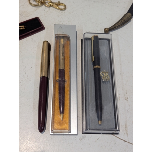 18 - Mixed collectables to include a christening cup, and egg cup and spoon, a Parker fountain pen and ot... 