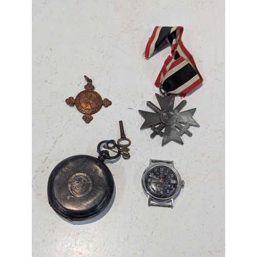19 - Mixed collectables to include a late 19th/early 20th century silver cased pocket watch, a German med... 