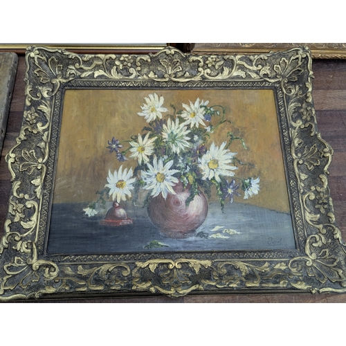 2 - Framed pictures to include an oil on board still life painting depicting two vases filled with flowe... 