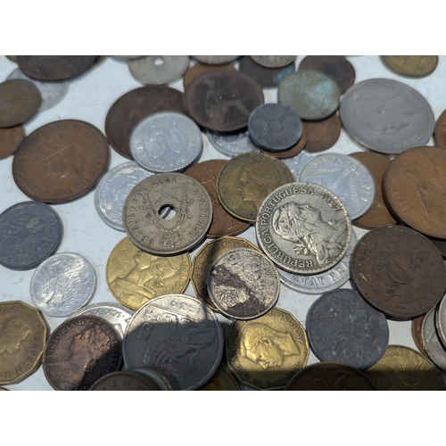 20 - World coinage to include a small selection of full and half-silver British coinage, commemorative ex... 
