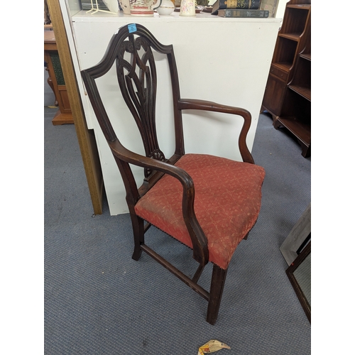 23 - A George III mahogany splat back carver chair on square moulded legs and a George III mirror Locatio... 