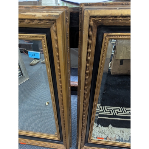24 - A pair of early 20th century gilt and black painted framed mirrors 78 x 68cm Location:LWF
If there i... 