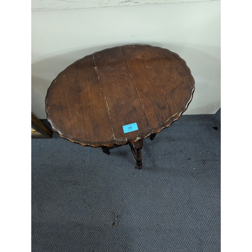 28 - A 1920s small oak folding table on turned legs 60cm h x 44cm w open Location:A4B
If there is no cond... 