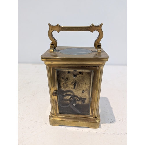35 - An early 20th century brass and glass cased carriage clock
Location:2-1
If there is no condition rep... 