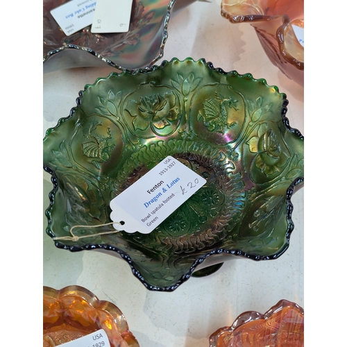 42 - A collection of carnival glass to include a Fenton Dragon and Lotus bowl, Fenton Diamond and Rib vas... 