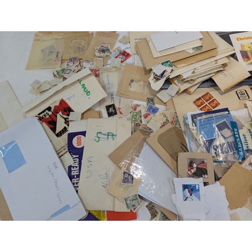 46 - Postage stamps from around the world to include four albums and loose examples from UK, China, India... 