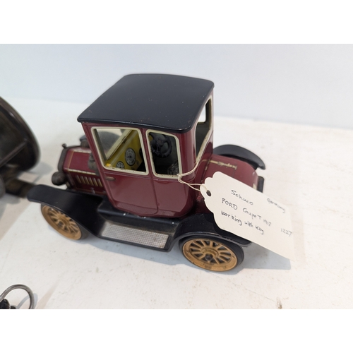 48 - Mixed collectables to include a vintage reel, a Schuco Ford car and other items
Location:
If there i... 