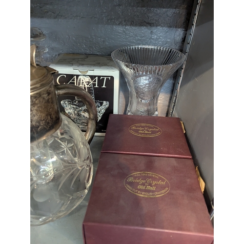 51 - A mixed lot to include a Arnstadt Kristall, Antike rubin vase, a cut glass pitcher with silver plate... 
