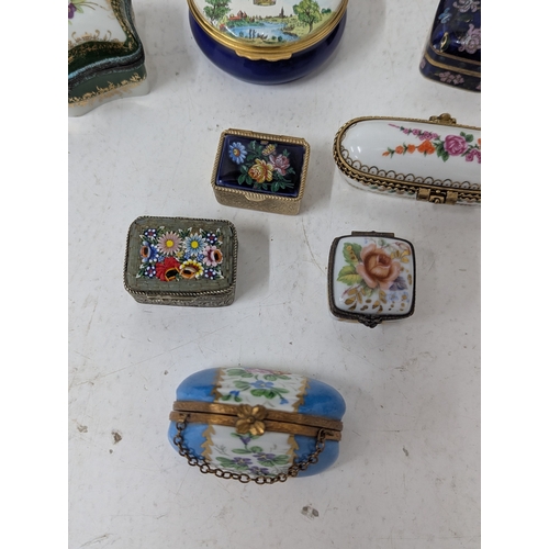 6 - A collection of enamel and porcelain trinket boxes to include Halcyon Days examples, a Limoges trink... 