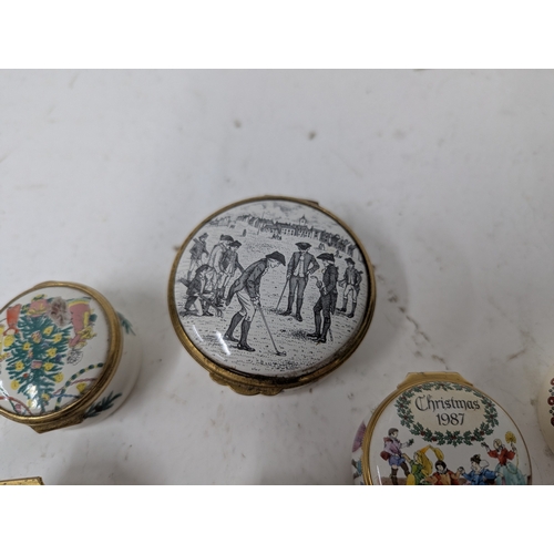 60 - A collection of enamelled trinket boxes, mainly by Halcyon Days, examples to include Bilston and Bat... 