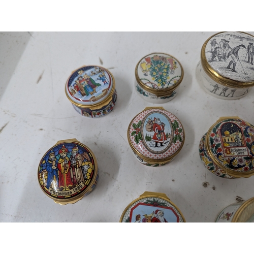 60 - A collection of enamelled trinket boxes, mainly by Halcyon Days, examples to include Bilston and Bat... 