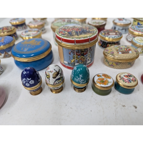 60 - A collection of enamelled trinket boxes, mainly by Halcyon Days, examples to include Bilston and Bat... 