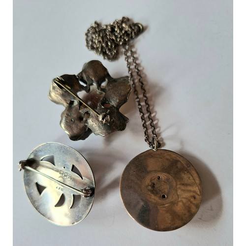 44 - Georg Jensen- A 1950's silver oval brooch with floral and leaf design No:138, 10.4g, stamped 925 Geo... 