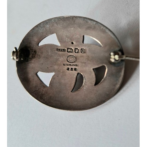 44 - Georg Jensen- A 1950's silver oval brooch with floral and leaf design No:138, 10.4g, stamped 925 Geo... 