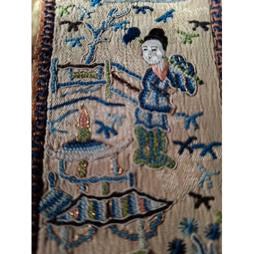 46 - Three late 19th/early 20th Century Chinese embroidered silk panels, two housed in one frame, all dep... 