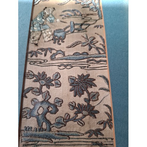 46 - Three late 19th/early 20th Century Chinese embroidered silk panels, two housed in one frame, all dep... 