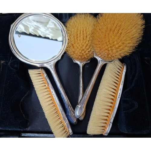 45 - A Walker and Hall silver and blue guilloche boxed set of 4 dressing table brushes and a hand mirror.... 