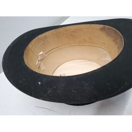 A 20th Century Dunn & Co black Melusine fur felt top hat with hat box ...