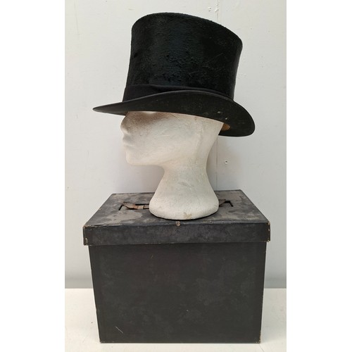 A 20th Century Dunn & Co black Melusine fur felt top hat with hat box ...