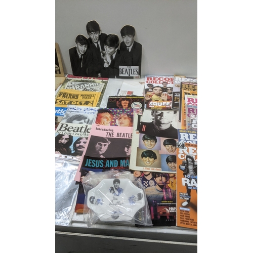 A collection of music memorabilia from the 1960s onwards to include LPs ...