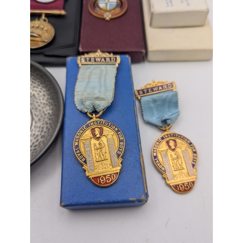10 - Masonic regalia to include a collection of silver and metal jewels comprising of a Masonic charity j... 