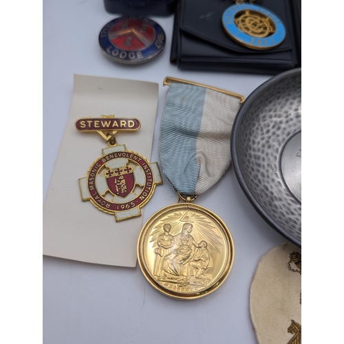 10 - Masonic regalia to include a collection of silver and metal jewels comprising of a Masonic charity j... 