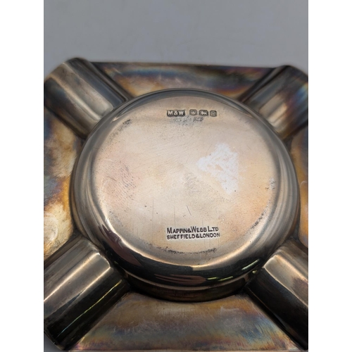 2 - Silver items to include a Mappin and Webb ashtray, having an engine turned decoration 33.9g together... 