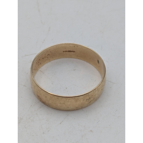 3 - A 9ct yellow gold wedding band stamped 375 with British hallmarks, size R1/2, weight 2.4g
Location:C... 
