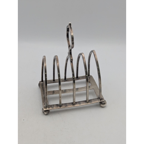 38 - A Victorian silver toast rack hallmarked London 1896, ny Johnson, Walker and Tolhurst Ltd, 115.4g
Lo... 