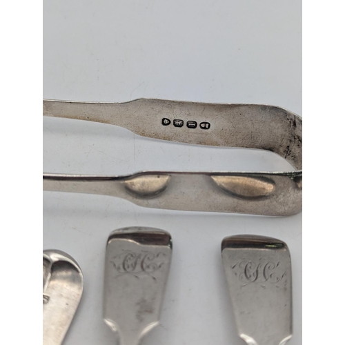 52 - Assorted silver flatware to include a set of four fiddle pattern teaspoons, two other teaspoons, tog... 