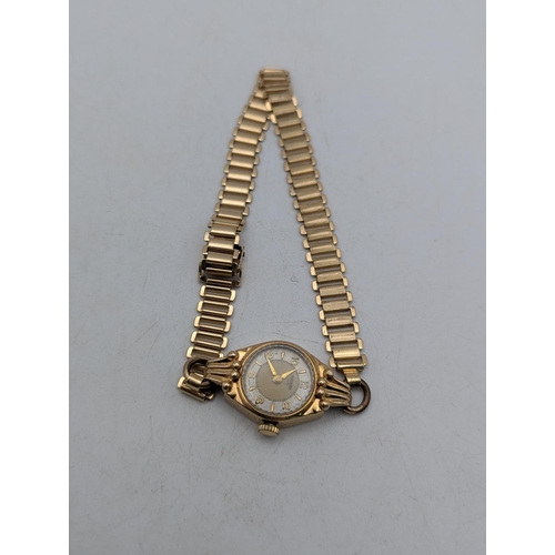53 - A 9ct yellow gold cased ladies Rotary wristwatch, on a gold-plated bracelet, total weight 17.8g
Loca... 