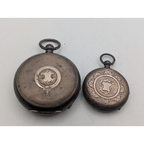 6 - A late 19th/early 20th century silver cased open faced pocket watch, along with a fob watch, both wi... 