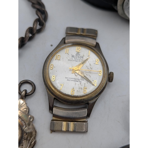 7 - A mixed group to include a white metal watch chain, with ball dog clasp and a silver T-bar, together... 