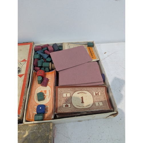 11 - A mixed group of collectables to include Egyptian tourist items, vintage board and card games and ot... 