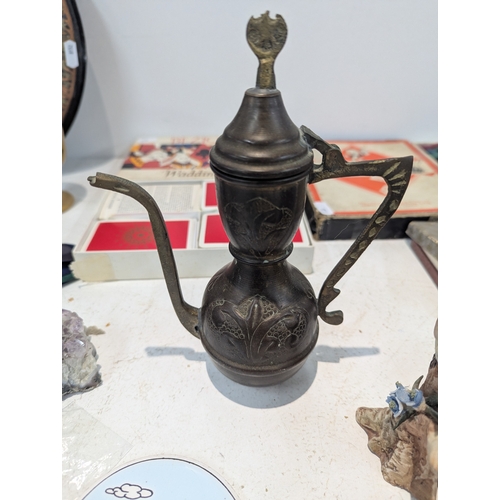 11 - A mixed group of collectables to include Egyptian tourist items, vintage board and card games and ot... 