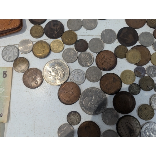 12 - World coinage and banknotes to include France, Britain and others, Malaya 5-cents banknotes and othe... 