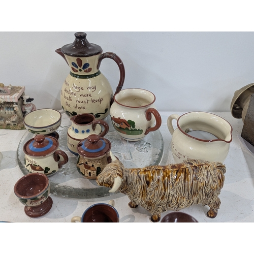 15 - A mixed lot of ceramics to include an assortment of bovine related ceramics to include a Beswick tog... 