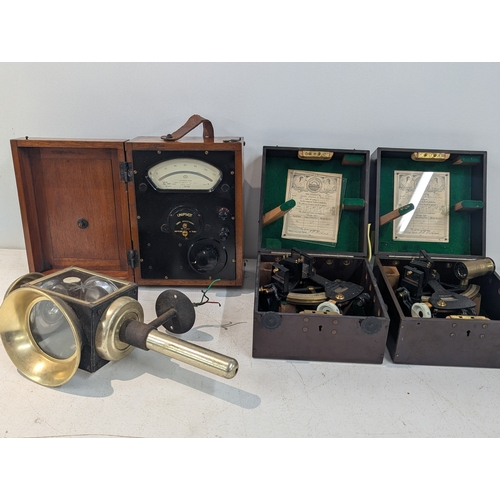 17 - Two vintage sextants by Henry Hughes and Sons Ltd, together with a Cambridge instrument and a lamp L... 