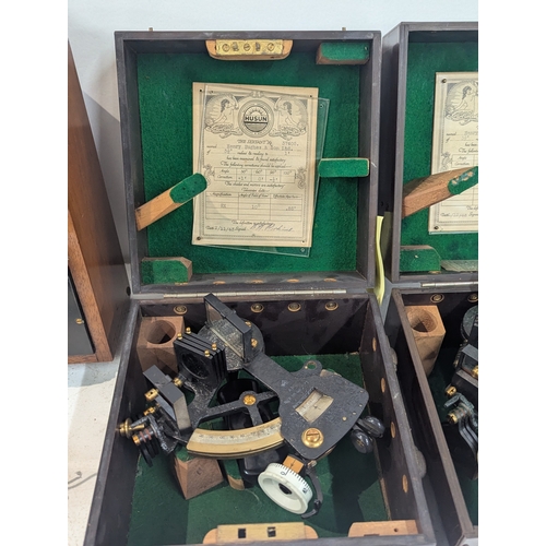 17 - Two vintage sextants by Henry Hughes and Sons Ltd, together with a Cambridge instrument and a lamp L... 