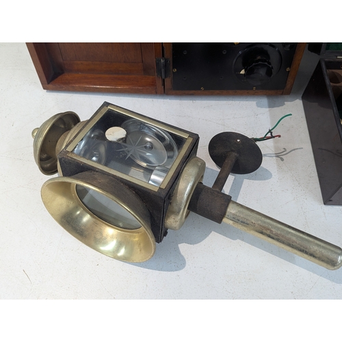 17 - Two vintage sextants by Henry Hughes and Sons Ltd, together with a Cambridge instrument and a lamp L... 