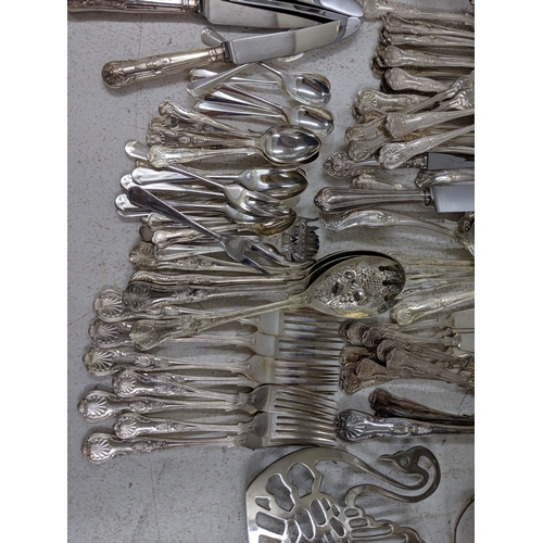 33 - Silver plated and E.P.N.S. items to include assorted flatware and cutlery, a large tray stand fashio... 