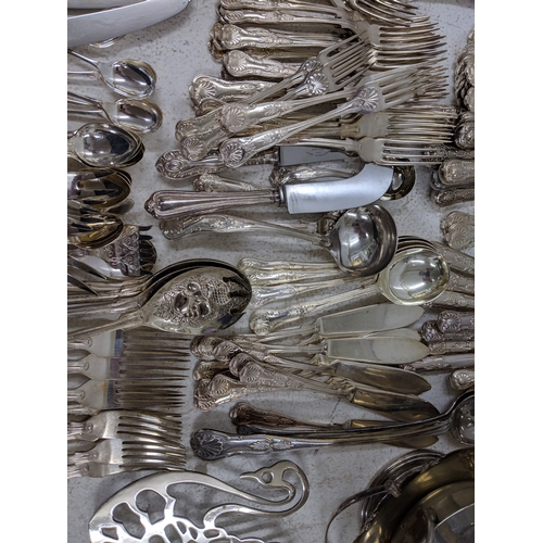 33 - Silver plated and E.P.N.S. items to include assorted flatware and cutlery, a large tray stand fashio... 