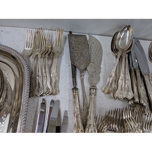 33 - Silver plated and E.P.N.S. items to include assorted flatware and cutlery, a large tray stand fashio... 