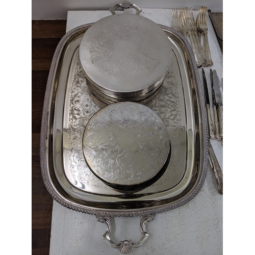 33 - Silver plated and E.P.N.S. items to include assorted flatware and cutlery, a large tray stand fashio... 
