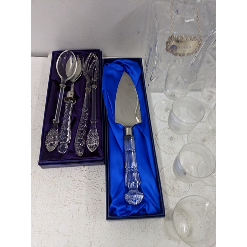 37 - A collection of glassware along with four crystal decanters all with decanter labels, one silver hal... 