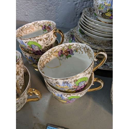 46 - A Garden House bone china 21-piece Crinoline Lady part tea set Location: 3-1
If there is no conditio... 