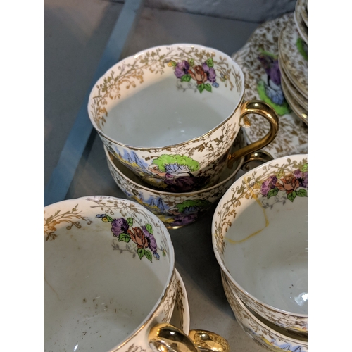 46 - A Garden House bone china 21-piece Crinoline Lady part tea set Location: 3-1
If there is no conditio... 