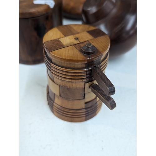 5 - Treen items to include two smoking pipe holders, a vintage wooden barrel puzzle, along with other it... 